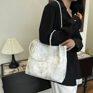 Large capacity tote bag with butterfly prints and white woven rope handles for women