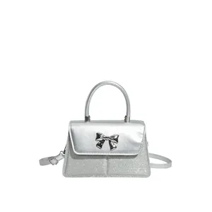 Elegant silver sequin bow handbag with mirror leather flap and detachable strap for party