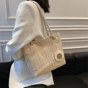 Chic woven tote bag in off-white with daisy detail and cotton rope shoulder strap