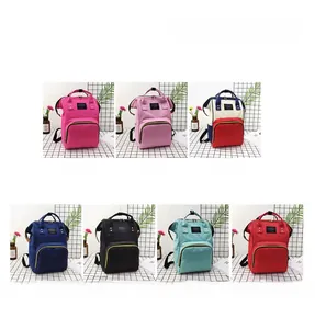 Collage of multi-color diaper backpacks including pink, blue, and black variants