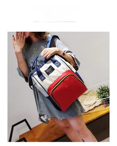 Detail of color-block diaper backpack with large capacity and durable nylon straps