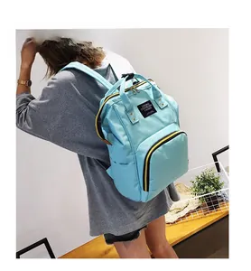 Light blue waterproof diaper backpack with large capacity and multi-pocket functional design