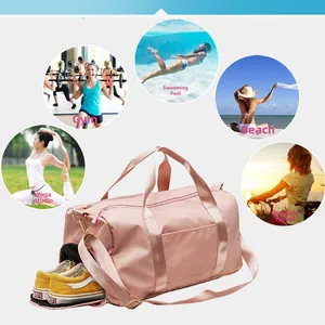 Pink waterproof nylon gym bag featuring a dedicated side compartment for shoe storage