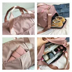 Pink nylon fitness bag showing side shoe compartment and waterproof fabric detail