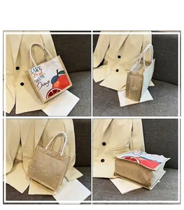 Detailweergave van jute draagtas met sinaasappelprint en dikke katoenen hengsels