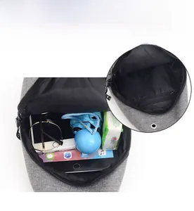 Interior view of grey oxford fabric chest bag showing spacious storage for iPad and essentials