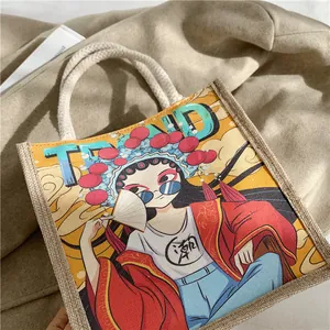 Detailed close-up of a canvas tote bag featuring a creative Peking Opera graphic design