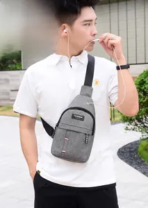 Gray Oxford fabric chest bag for men featuring adjustable strap and fashion label detail