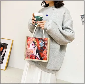 Detail of linen tote bag with traditional Chinese opera illustration and cotton rope handles