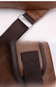 Détail des ferrures métalliques argentées et de la couture en X renforcée du sac marron
