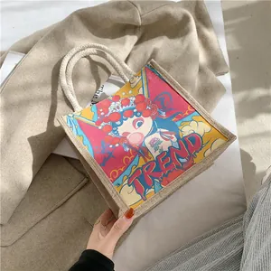 Detail of canvas tote bag with Beijing Opera print and thick rope handle design