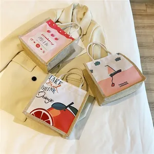 Three stylish mini canvas tote bags with rope handles and colorful fruit prints for women
