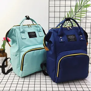 Large capacity color-block diaper bags in mint green and navy blue for mothers