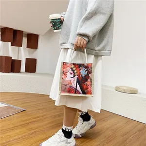 Chic tote bag featuring a vibrant Peking Opera character print and woven handles