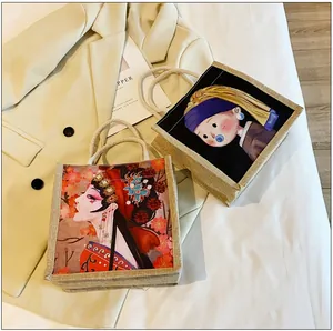Detail of artistic canvas tote bags with cotton rope handles on an elegant blazer