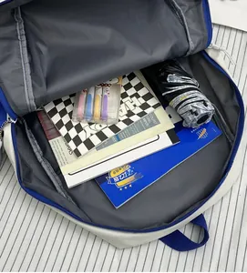 Interior view of large capacity backpack showing main compartment filled with books and items