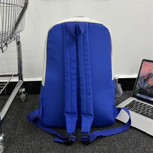 Blue and beige canvas backpack with large capacity and cute doll pendant accessory