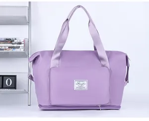 Macro detail of purple waterproof travel bag showing texture and expandable zipper base