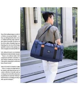 Macro detail of dark blue waterproof nylon travel bag with brown leather accents and logo