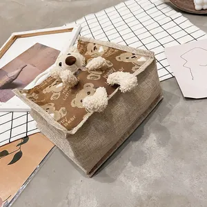 Cute canvas lunch bag with 3D plush bear decoration and Happy Little Bear print