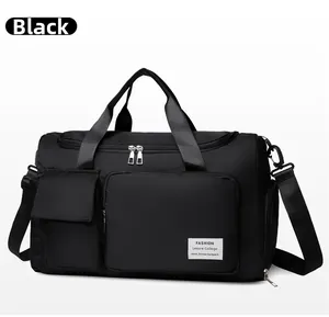 Detail of waterproof black gym bag with shoe compartment and fashion logo label