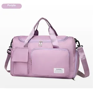 Detail of lavender purple fitness bag showing side shoe compartment and nylon texture
