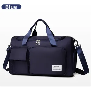 Close-up of blue gym bag showing waterproof nylon fabric and dual zipper detail
