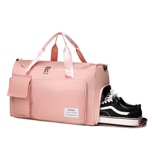 Bolsa de deporte rosa impermeable con compartimento para zapatos y viaje