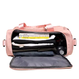 Bolsa de deporte rosa de nailon impermeable con gran capacidad y separación en seco