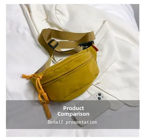 Detail view of ginger nylon chest bag size compared with a smartphone