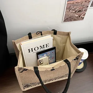 Large capacity jute tote bag with ethnic pattern print and black canvas handles