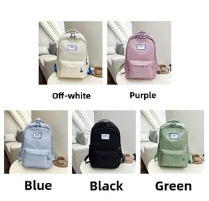 Minimalist waterproof nylon backpacks shown in off-white, purple, blue, black and green