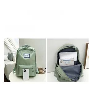 Detail view of the large capacity interior showing the laptop compartment and books