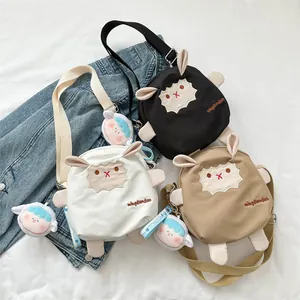 Sac Bandoulière en Toile Mouton Dessin Animé pour Femmes Style Japonais Sac à Épaule Brodé Avec Pendentif en Peluche Décontracté