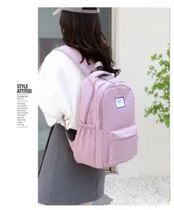 Outdoor shot of light purple waterproof nylon backpack with adjustable straps and side pocket