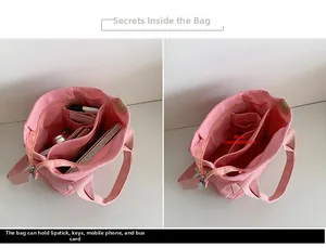 Scomparti interni della borsa tote in tela rosa e capacità per oggetti quotidiani