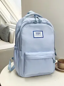 Minimalist light blue waterproof backpack with large capacity and mesh top handle
