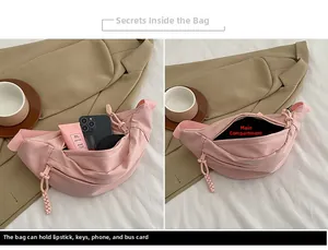 Detail view of pink crossbody bag interior showing spacious main pocket and daily essentials