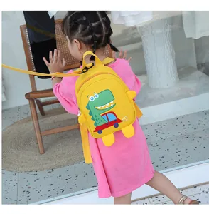 Detailed back view of a yellow toddler dinosaur backpack with anti-lost safety leash
