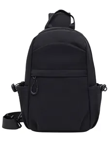 Minimalist black casual crossbody chest bag with adjustable strap and drawstring detail