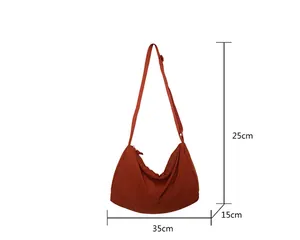 Detailed size specifications of the brick red nylon crescent crossbody travel bag