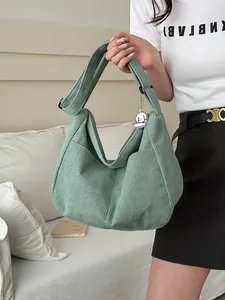 Large light green corduroy hobo shoulder bag with a cute white dog charm for women