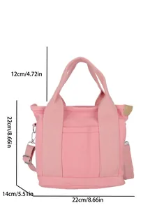 Dimensioni della borsa in tela rosa con altezza e larghezza di 22 cm e profondità 14 cm