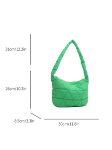 Quilted green padded shoulder bag with dimensions displayed on a white background