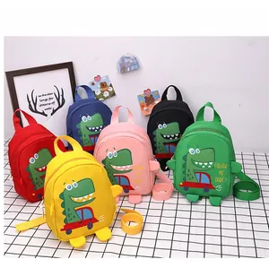 Detail view of colorful cartoon dinosaur canvas crossbody bags for kids in six vibrant colors