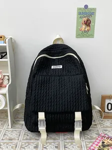 Minimalistische zwarte gewatteerde rugzak met golfpatroon en beige bandjes