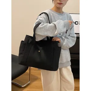 Bolso tote de lona negra minimalista para mujer, bolso de hombro grande para ir al trabajo