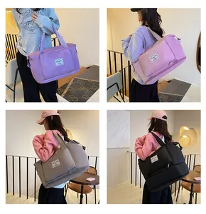 Detail of expandable travel bags in four colors with suitcase trolley sleeve and shoe pocket