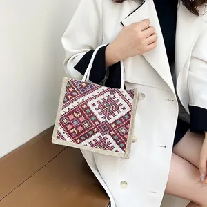 Ethnic bohemian canvas handbag with colorful geometric patterns and white rope handles