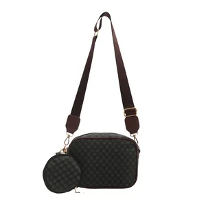 Retro monogram crossbody bag in brown and black with wide strap and round coin purse